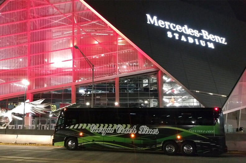 Bus parked in front of an events center